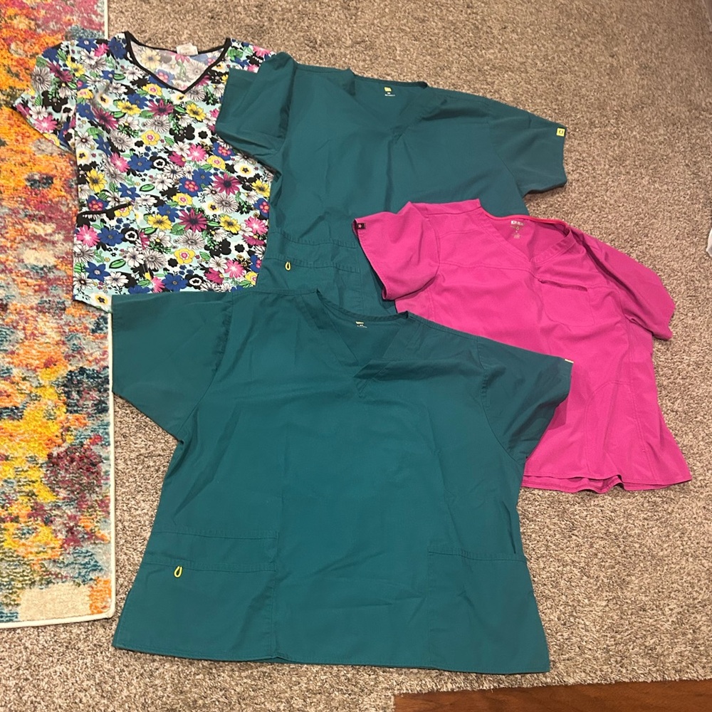 Lot of four 3XL scrub tops.